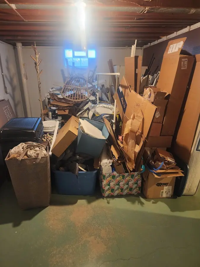 Roll-off dumpster container at job site for Cleanout Dumpster Rental in West Liberty